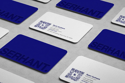 sample blue and white business cards from ryan serhant